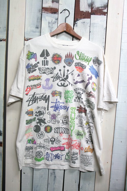 STUSSY (ステューシー) 総柄 Tシャツ 古着 ビンテージ ホワイト サイズ：XL・古着屋ヘブンズドア・古着 通販