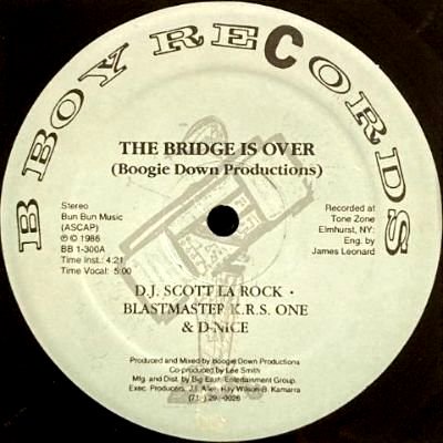 BOOGIE DOWN PRODUCTIONS - THE BRIDGE IS OVER (12) (BLUE) (VG/EX)