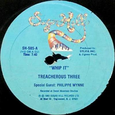 TREACHEROUS THREE - WHIP IT (12) (VG+/VG+)