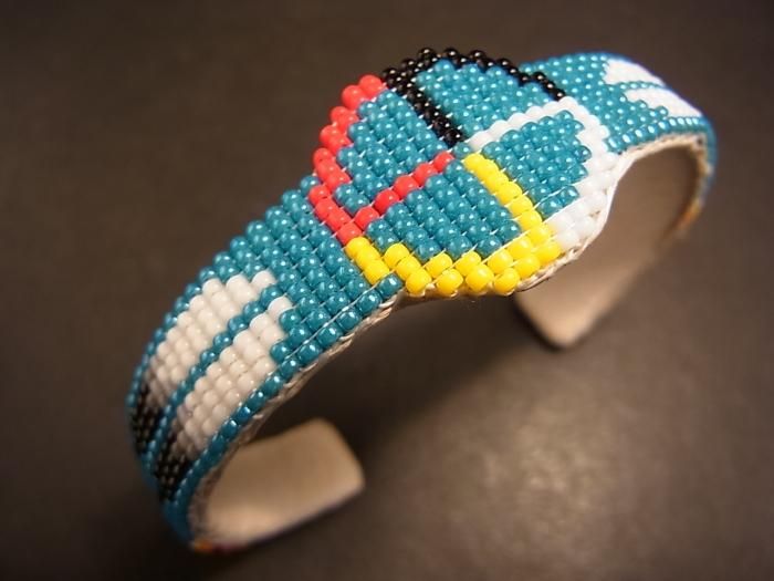 トーマス・カーティス作 バタフライバングル ランダーブルーターコイズ